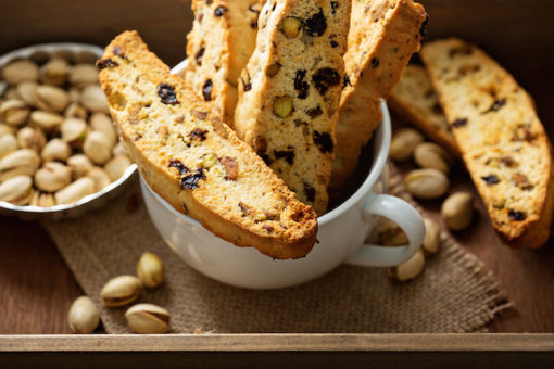 Homemade biscotti with dried fruits and nuts in a big cup