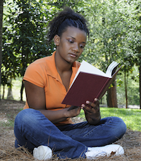 woman reading park
