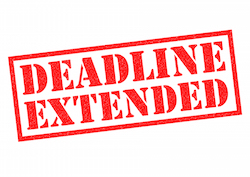 DEADLINE EXTENDED red Rubber Stamp over a white background.