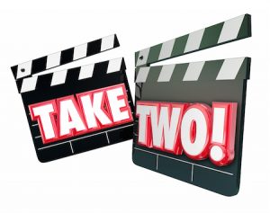 Take Two 2 words on movie or film clapper boards to illustrate a redo or trying again with second at